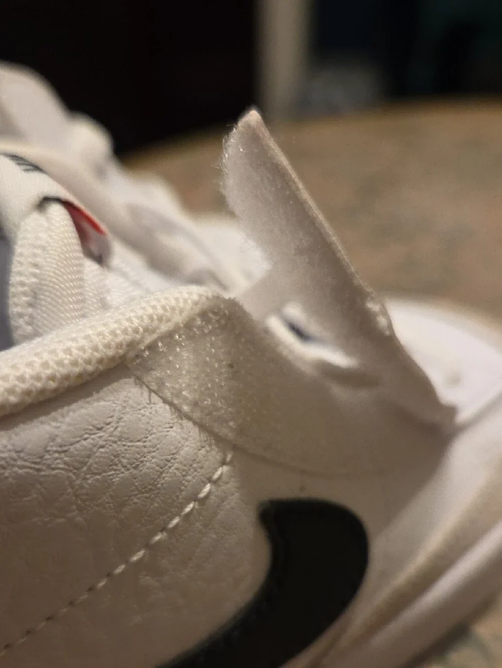 Nike Kids White High-Top Sneakers with Black Swoosh